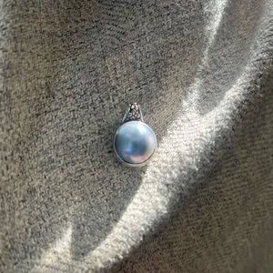 Natural blue maple pearl pendant in 925 silver